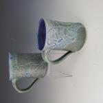 Blue Green Leaf Mugs - $47
4.5 in tall - SKU BGLM61122_1
5 in tall - SKU BGLM61122_2